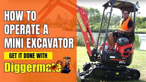 mini digger on its side|how to operate a mini excavator.